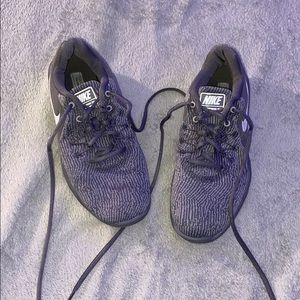 Grey Nike tennis shoes